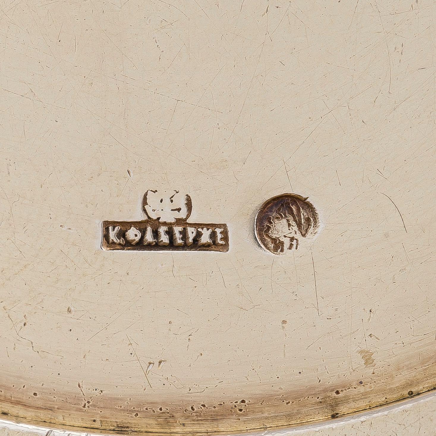 K. Fabergé, a silver sugar bowl and cream jug, Imperial Warrant mark, Moscow ca. 1913.