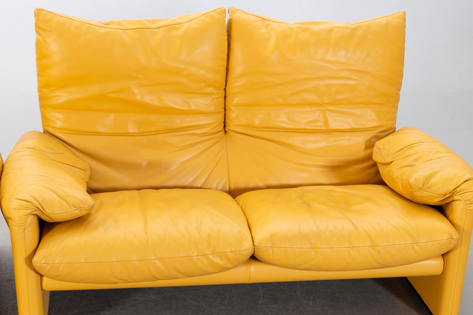 A "Maralunga" leather sofa and easy chair by Vico Magistretti, Italy.