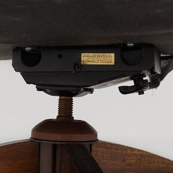 a english style desk chair from the second half of the 20th century.