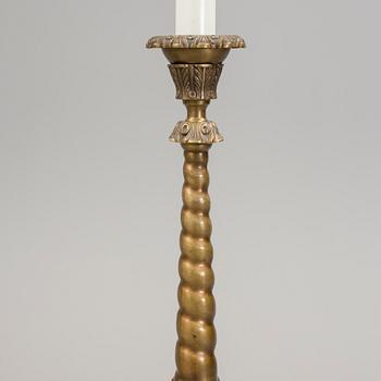 a early 20h Century brass floor lamp.