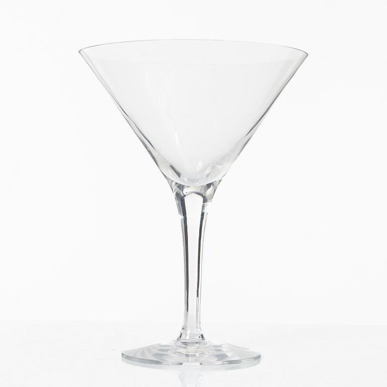 A set of 46 glass service parts, including 'Elixir Connoisseur' and Gunnar Cyrén, 'Optica', Orrefors.