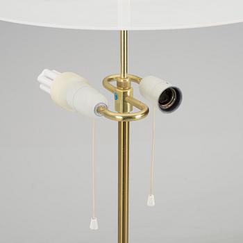 A 1960s brass floor light.