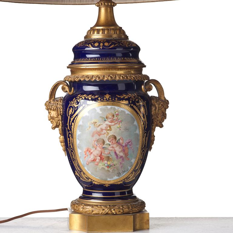 A French bronze mounted porcelain table lamp, late 19th Century, signed Thuilier.