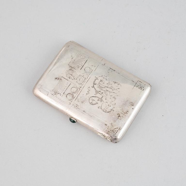 A Russian Art Nouveau parcel-gilt silver cigarette-case, mark of the 2nd Arthel, Moscow 1908-1917.