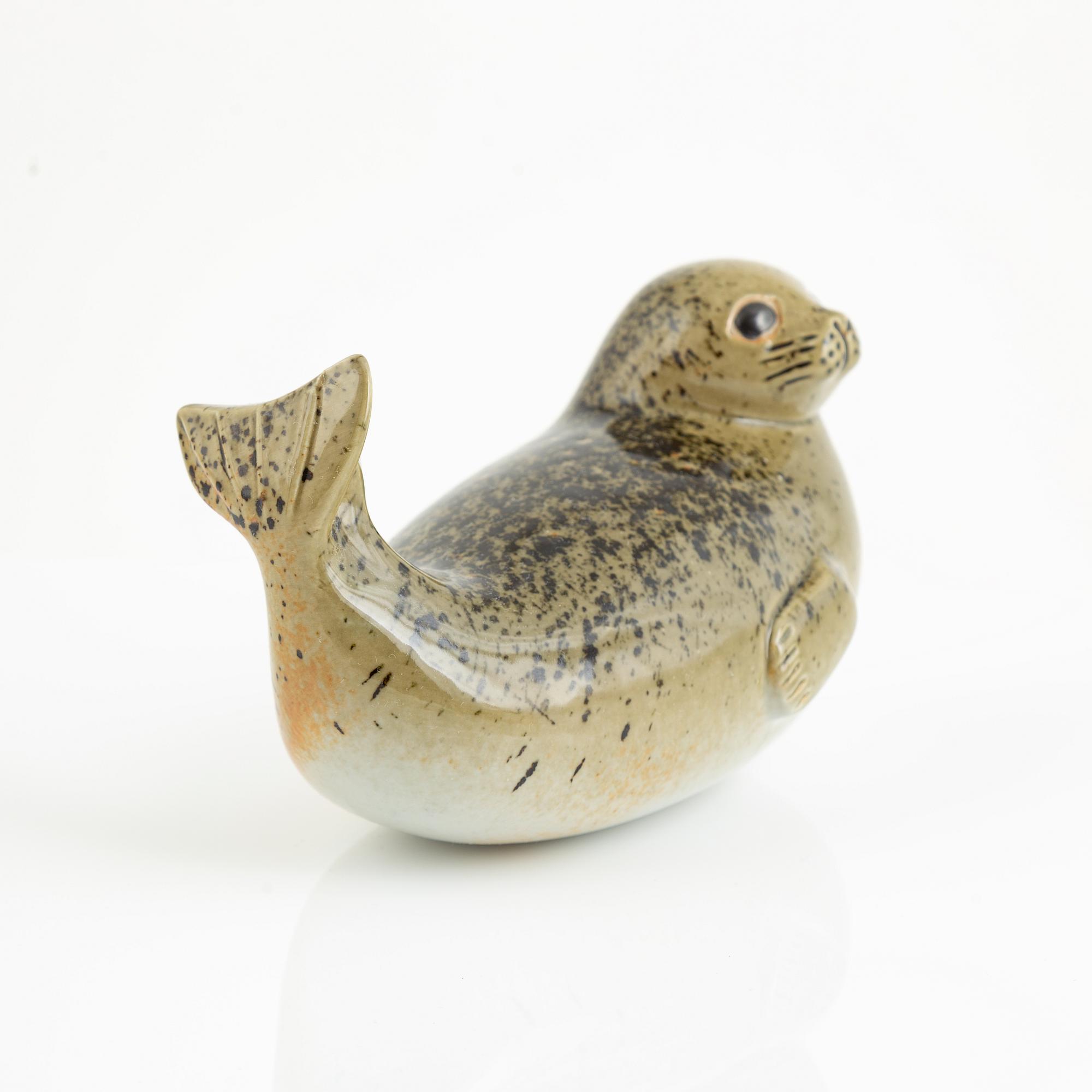 Lisa Larson, two figurines, 'Utter' and 'Gråsäl' for Nordiska Kompaniet in collaboration with WWF, Gustavsberg.