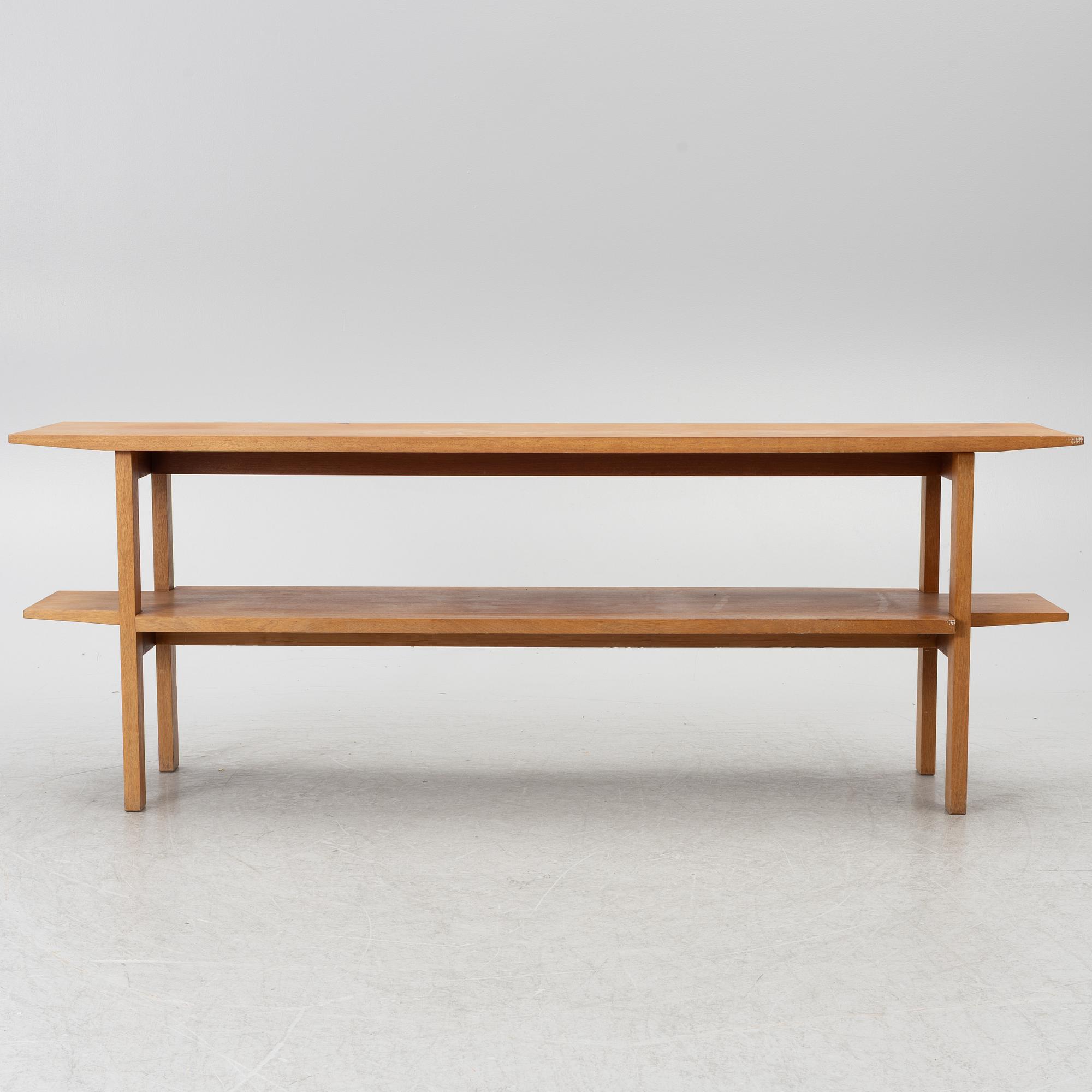 Josef Frank, a model 648 library table, Firma Svenskt Tenn, Sweden, before 1985.