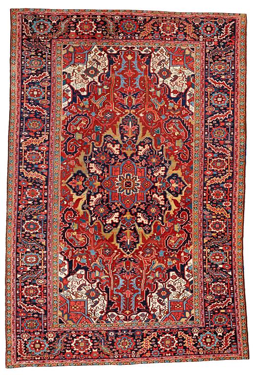 A CARPET, a semi-antique Heriz, ca 329-340 x 223,5-232 cm.