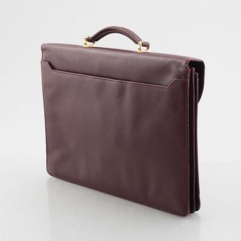 Cartier, a briefcase.