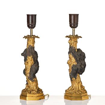 A pair of Russian Alexander III gilt and patinated bronze table lamps, late 19th century.