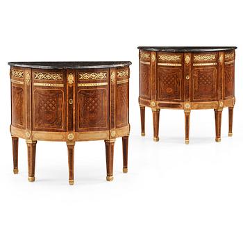 1186. A pair of Gustavian late 18th century demi-lune cupboards by Gottlieb Iwersson (not signed), master in Stockholm 1778.