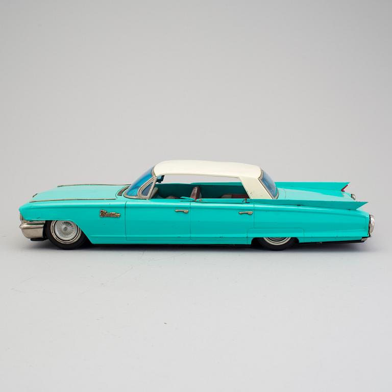 A tinplate Ichiko Cadillac Japan ca 1962.