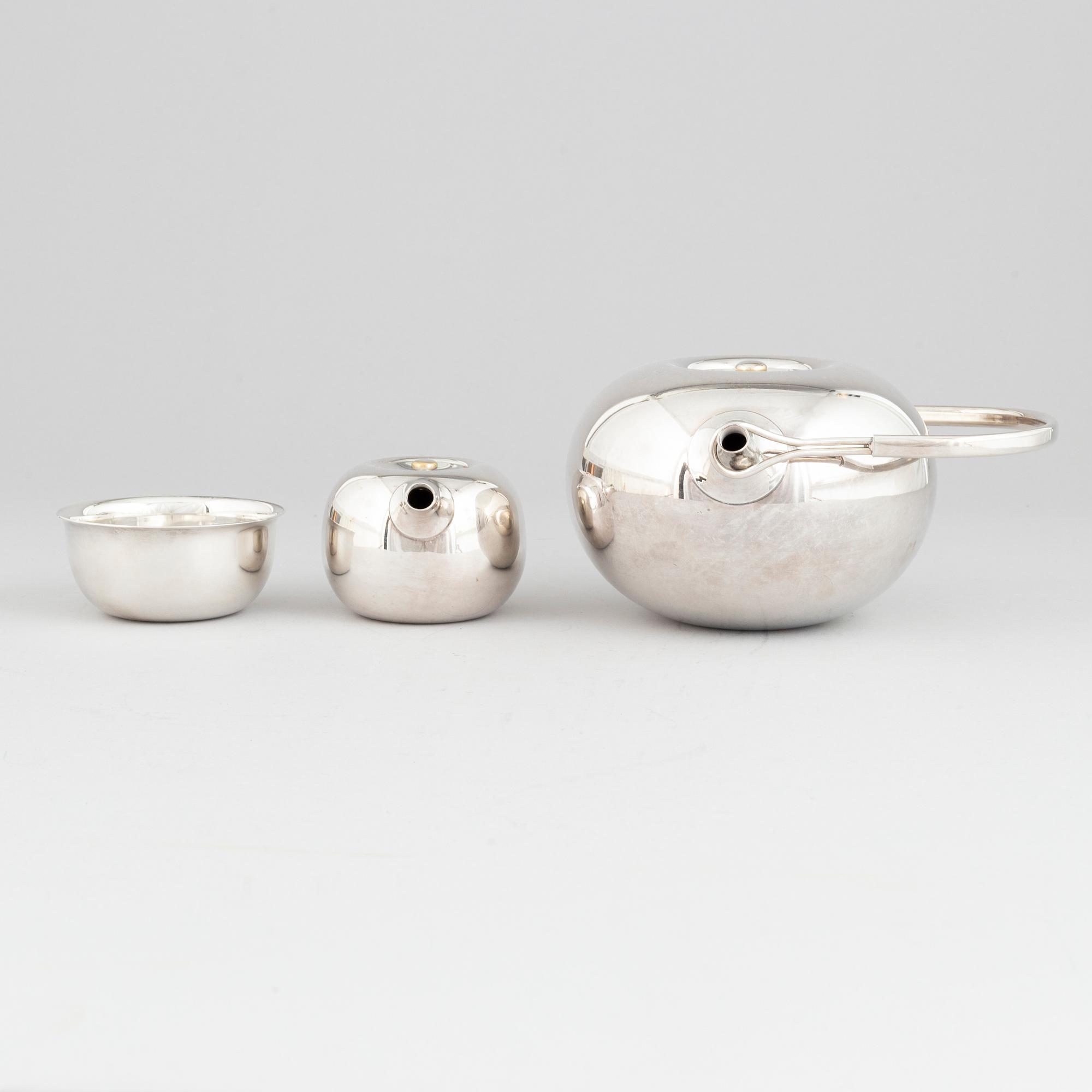 Vivianna Torun Bülow-Hübe, an electroplated brass teapot, a creamer and a sugarbowl, Dansk International Designs Ltd.