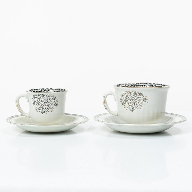 Wilhelm Kåge, a 92-piece creamware dinner and coffee service, 'Lyx', Gustavserg, Sweden, in production 1925-36.