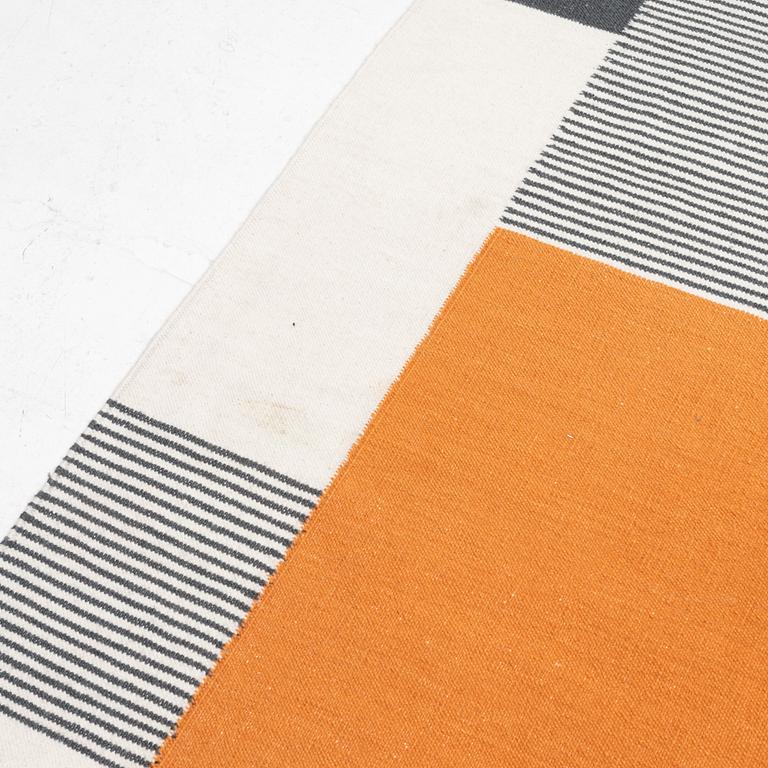 A 'Graphic Orange' carpet, Linie Design, c. 300 x 200 cm.