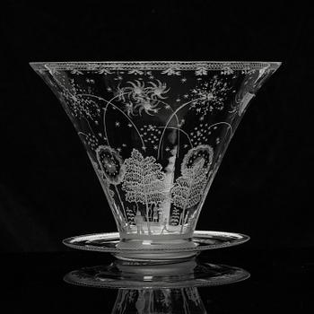 Edward Hald, a Swedish Grace "Fyrverkeri" (Fireworks) engraved glass bowl with a plate, Orrefors, Sweden, 1925, model 248.