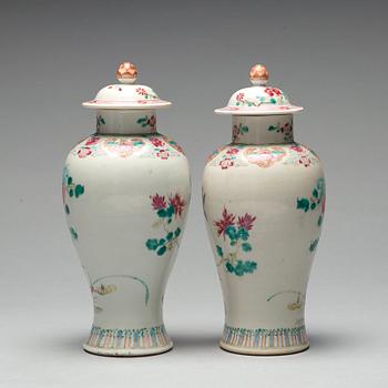 A pair of famille rose vases with covers, Qing dynasty, Qianlong (1736-95).