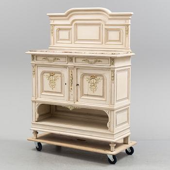 a Louis XVI-style sideboard from the 20th century.