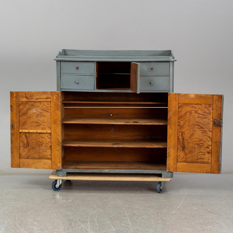 A mid 19th century painted cupboard.