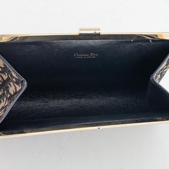 Christian Dior, a clutch and silk scarf.