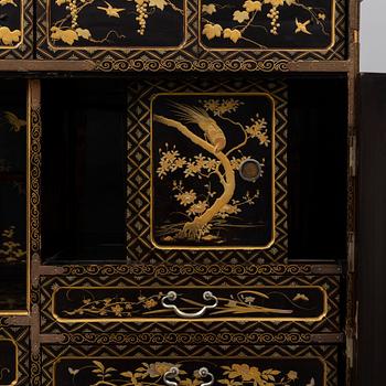 A Japanese lacquer work cabinet, early 20th Century.