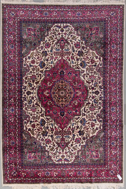 An eastern european carpet, around 294 x 205 cm.