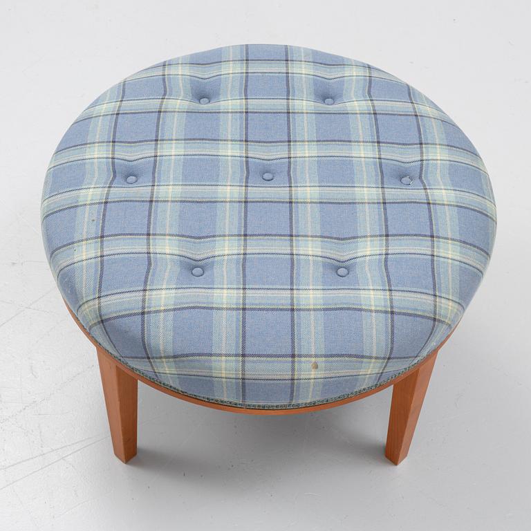Josef Frank, a model 647 cherry wood stool by Firma Svenskt Tenn.