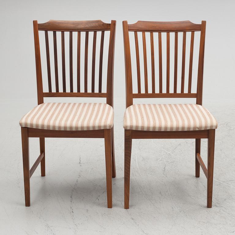 Dining table and four chairs, second half of the 20th century.