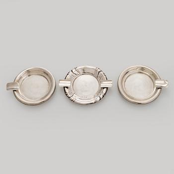 A silver cigarette case, matchbox holder and small bowl, Sandrik, as well as 3 ashtrays, Czechoslovakia 1929-1945.