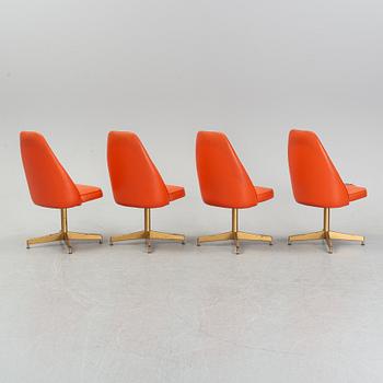 A dining table with four chairs, Walter of Wabash, table dated 1960.