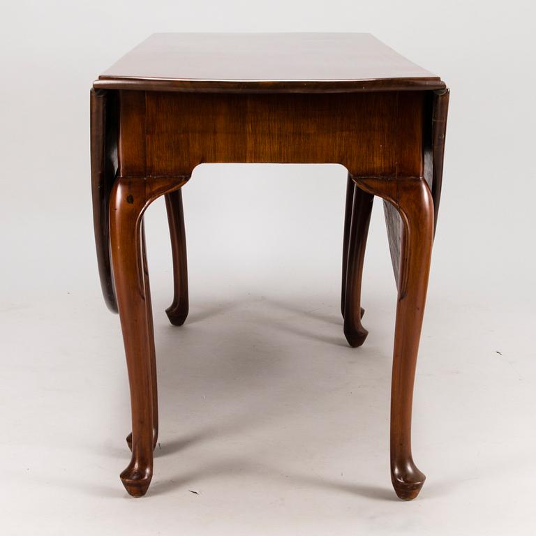 An 18th century English drop-leaf table.