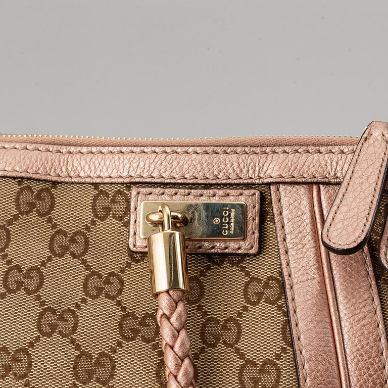 Gucci, a monogram canvas bag.
