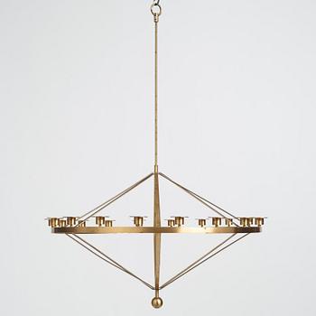 Sigurd Persson, an 18 candles brass chandelier, Sweden, probably 1960s.