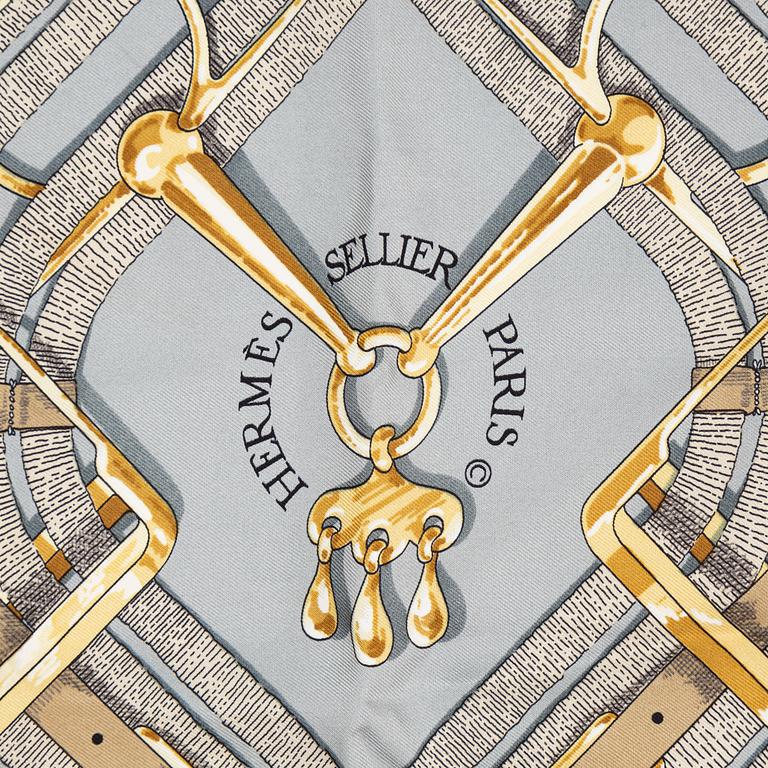 Hermès, a 'Mors et Jouets' silk scarf.