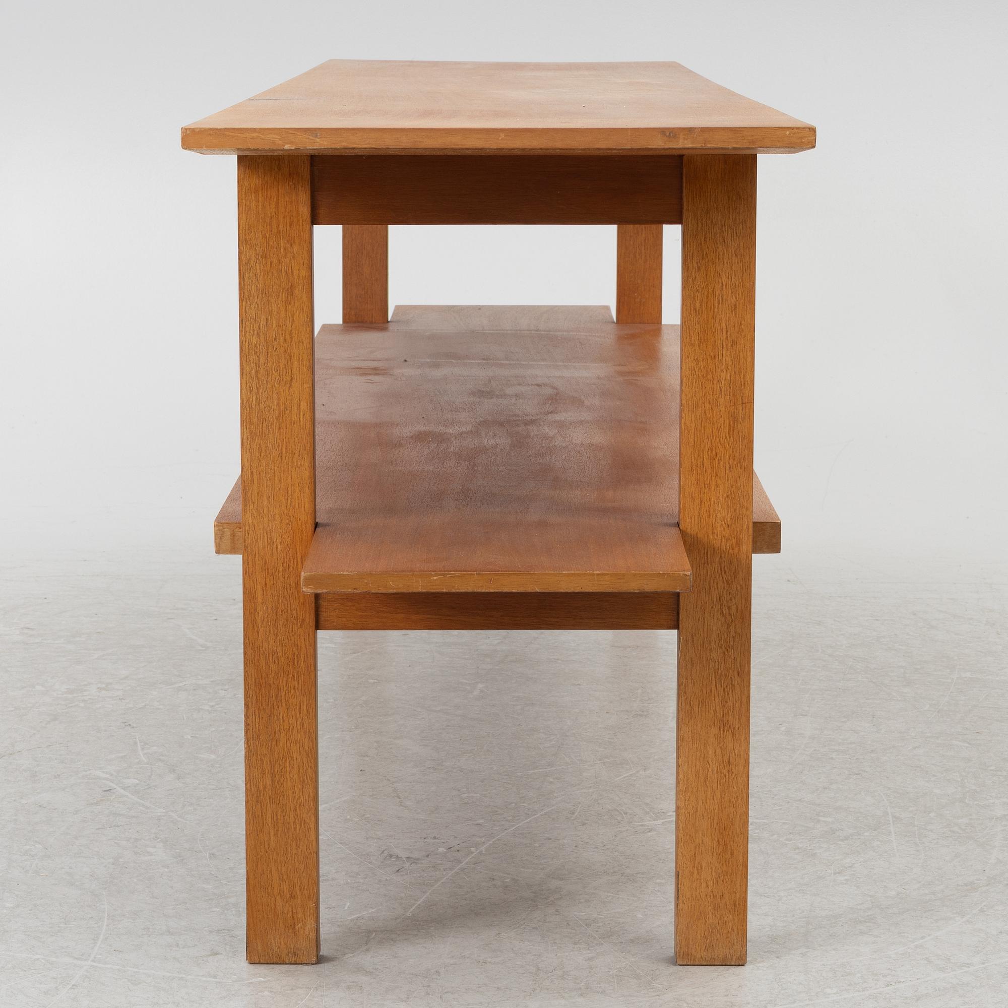 Josef Frank, a model 648 library table, Firma Svenskt Tenn, Sweden, before 1985.