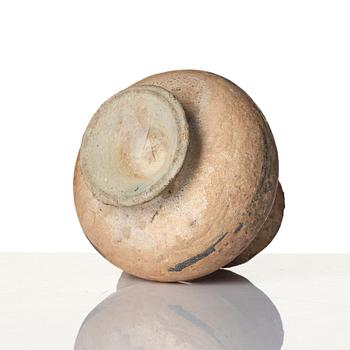 A central Asian pottery jug 12th-13th century.