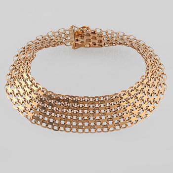 ARMLÄNK, 18K guld, Stockholms ädelsmide, 1964. Vikt 16,1 gram.