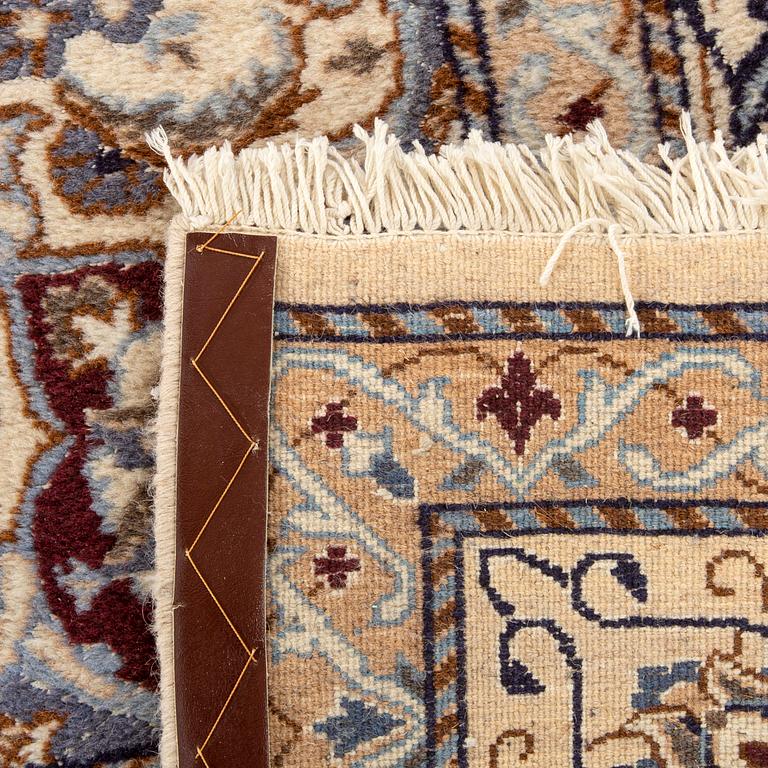 An old Kerman carpet ca 349 x 242 cm.