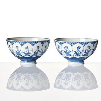 A pair of blue and white bowls, Qing dynasty, with Xuantong mark and of the period (1909-11).