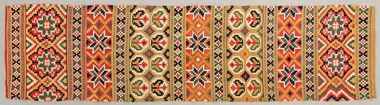 A Swedish flatweave bänkalängd Scania around 1900, ca 222 x 55 cm.