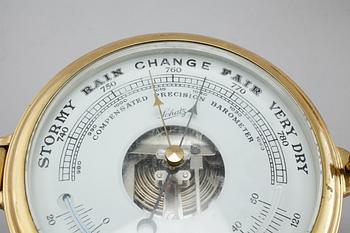 A wall clock and a barometer from Schatz, made in the fourth quarter of the 20th century.
