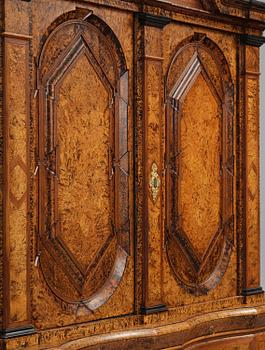 A Swedish late baroque burr-alder cabinet, first part 18th century.