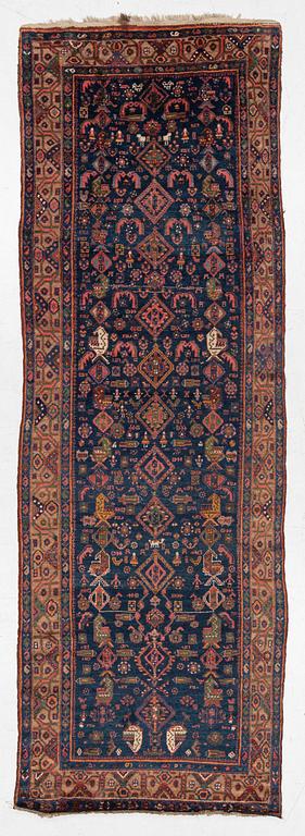 A semi-antique Northwest Persian runner, c. 388 x 94 cm.