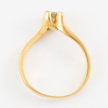 Ring, 18K guld med briljantslipad diamant.