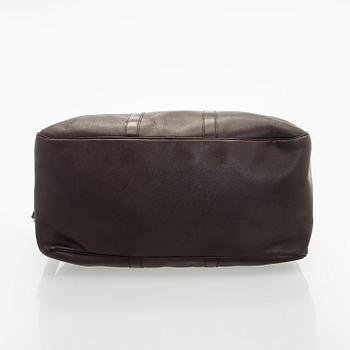 Louis Vuitton, a 'Taiga Kendall PM' weekend bag.