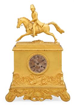 800. A Swedish Empire Equestrian gilt bronze mantel clock depicting king Karl XIV Johan.