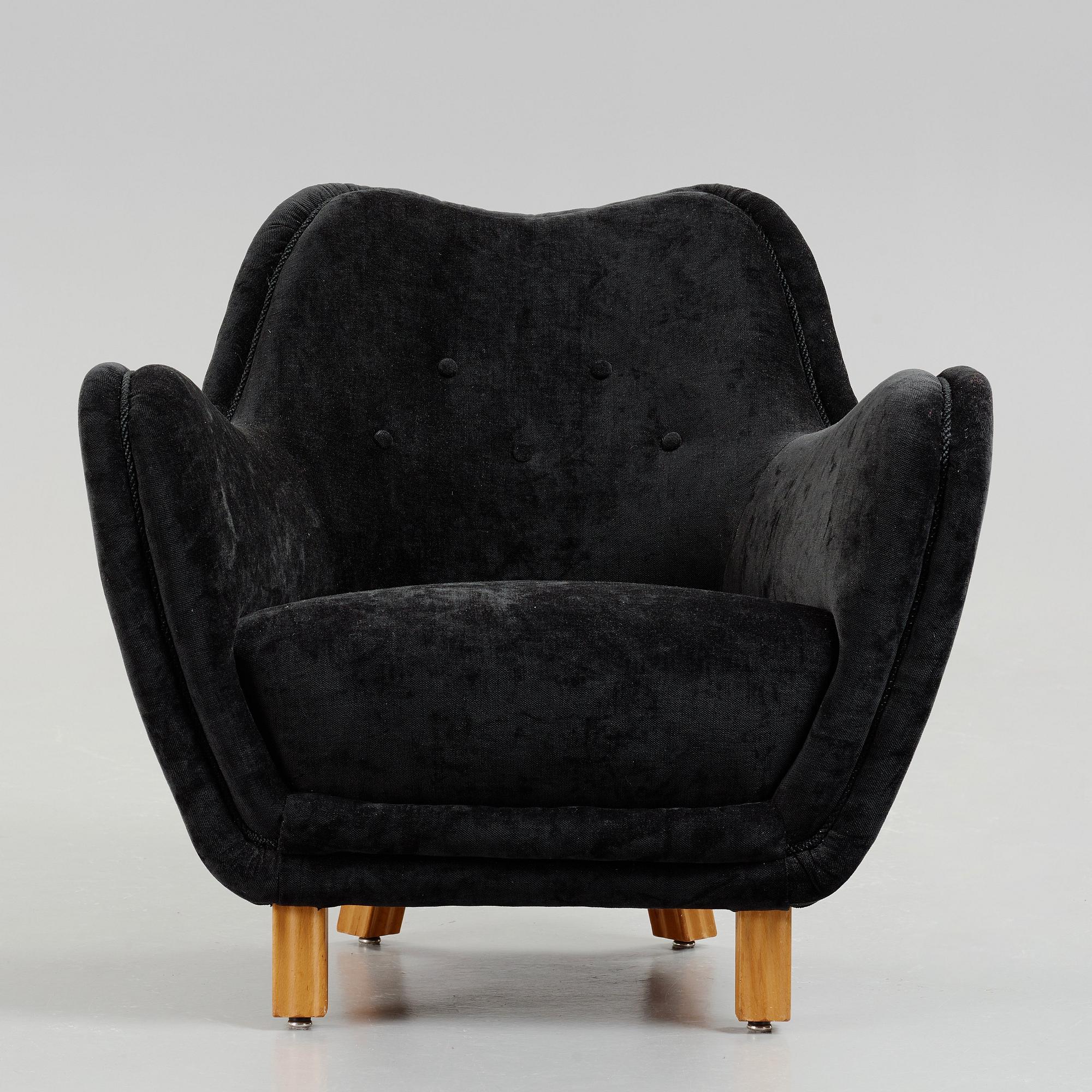Swedish designer, an upholstered easy chair, 1950's.