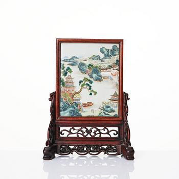 1280. A famille rose table screen in a wooden stand, Qing dynasty, 19th Century.