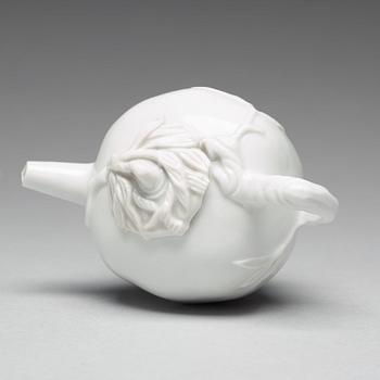 A pomegranate-shaped blanc de chine teapot with cover, Qing dynasty, Kangxi (1662-1722).