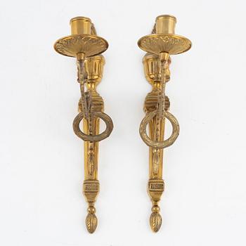 A pair of 'Törne' brass one-light wall ligths from IKEA's 18th Century collection.