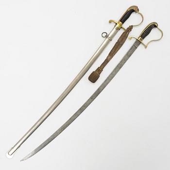 Two German sabres, 19th Century, one with scabbard.